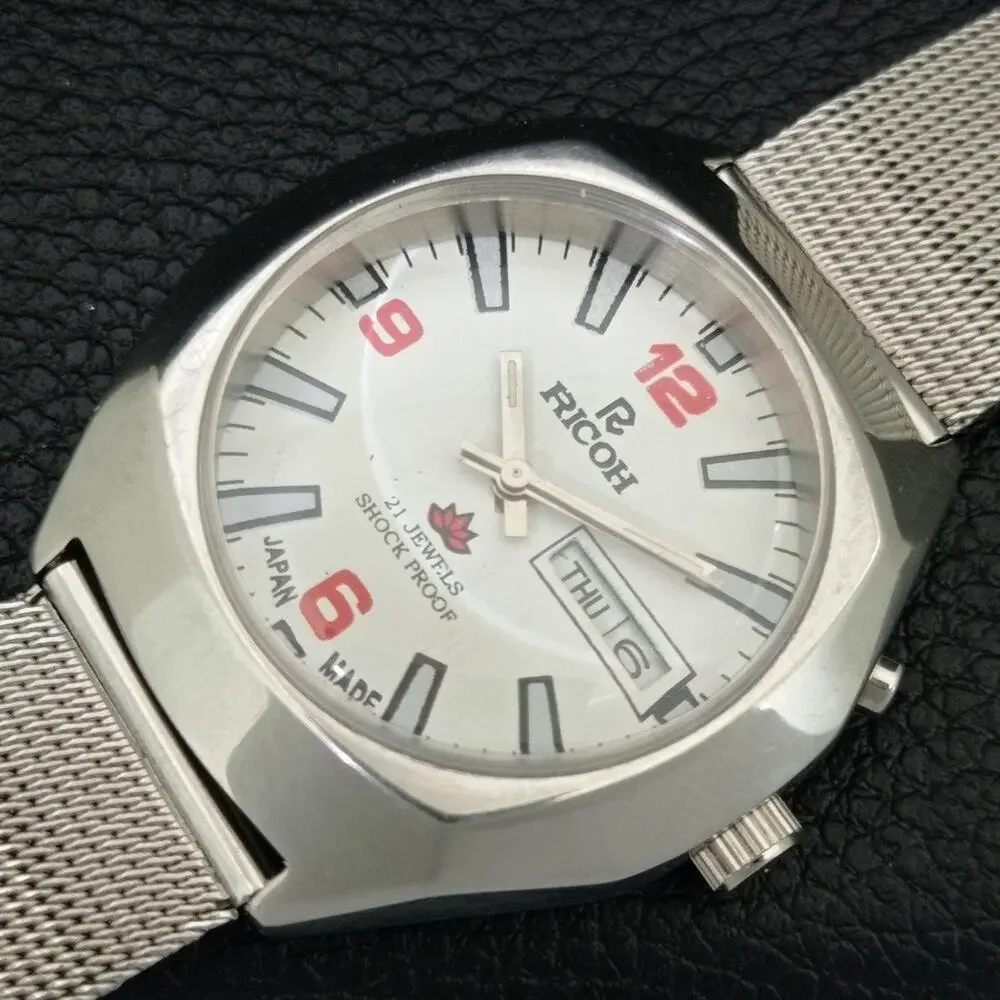 Vintage 1976 Ricoh Automatic Mens Silver Watch W/daydate & Red accents